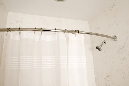 shower curtain on a curved rod